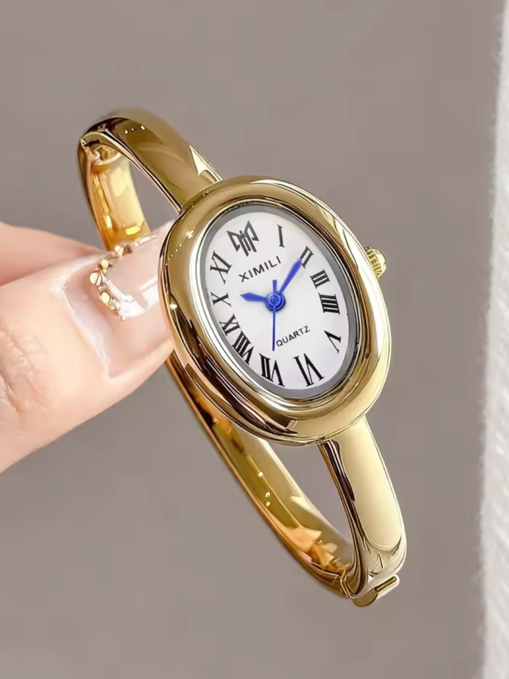 Elegant Gold-Tone Stainless Steel Bangle Watch